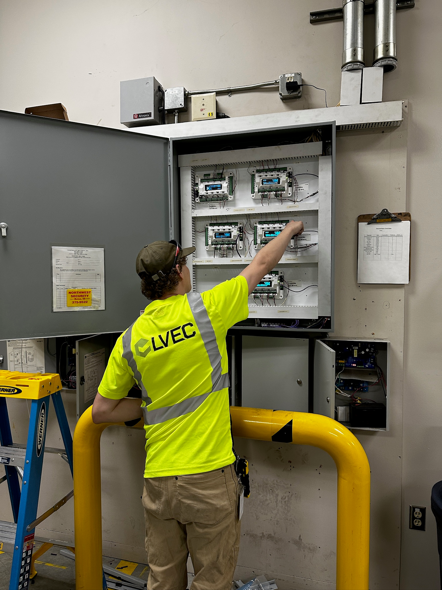 LVEC technician servicing commercial access control panel in Utah