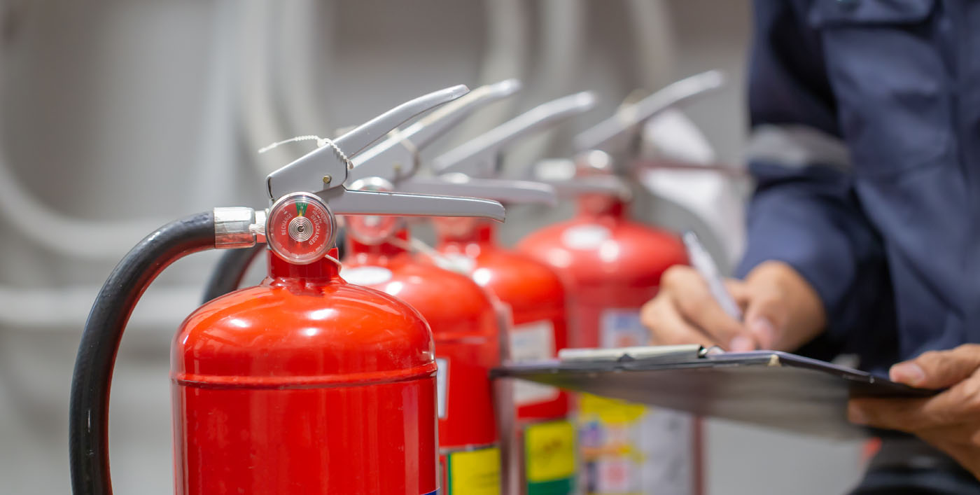 A group of fire extinguishers in a commercial business.