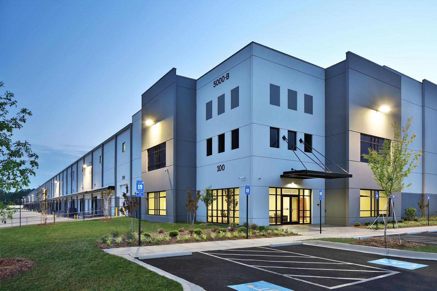 A commercial building in the local area with security systems installed around the exterior of the building.