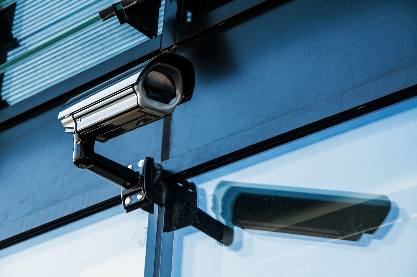 A camera installed on an outside building.